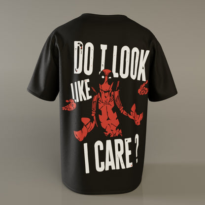 Back of black Deadpool oversized t-shirt with bold red graphic and sarcastic "Do I Look Like I Care?" quote, by Badgers